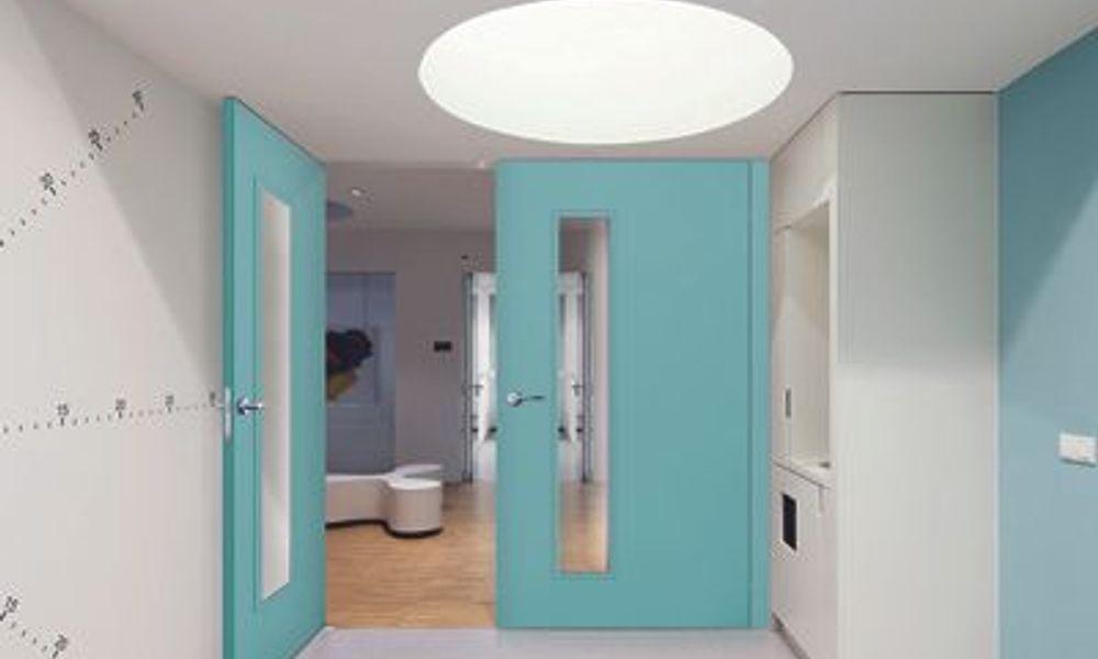 Waiting room in the children's centre at the Eye Hospital, Rotterdam, The Netherlands. White and pal
